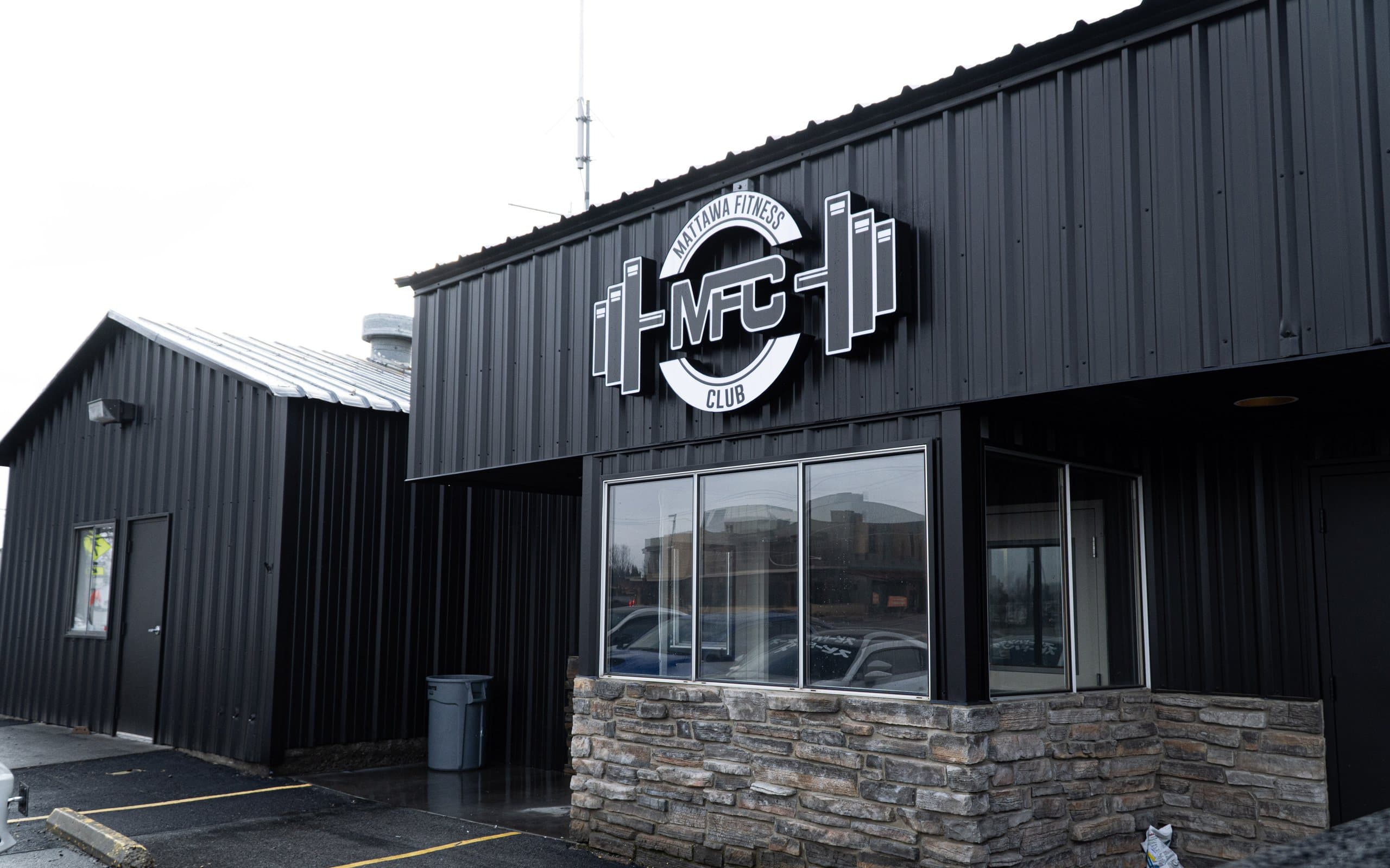 Mattawa Fitness Club from the parking lot: the black metal building with the white MFC sign above the front windows
